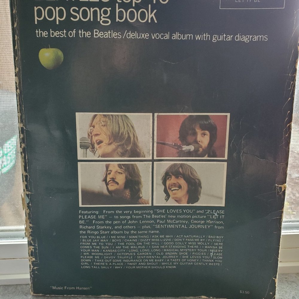 Vintage The New Beatles Top 40 pop song book with guitar diagrams.